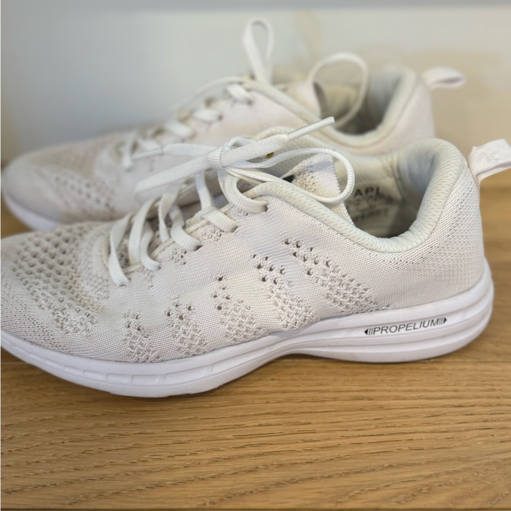 White APL tennis shoes